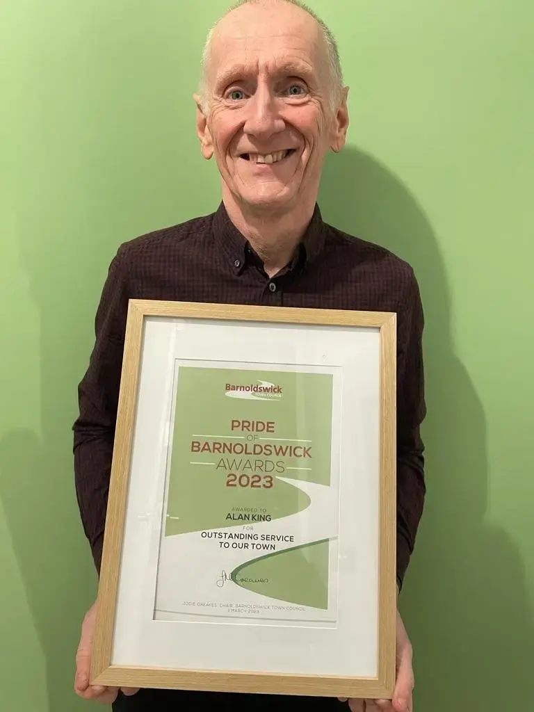 Alan with his certificate.