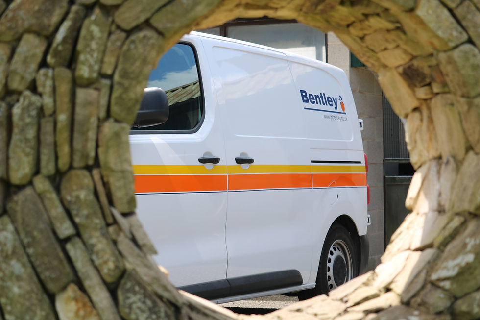 A white van with JN Bentley logo on the side