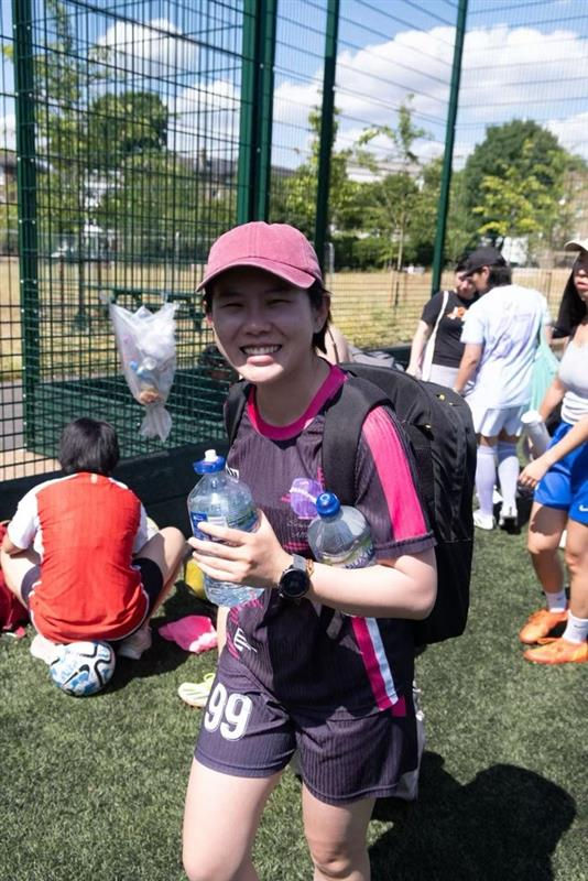 Ruoqi leading her football team