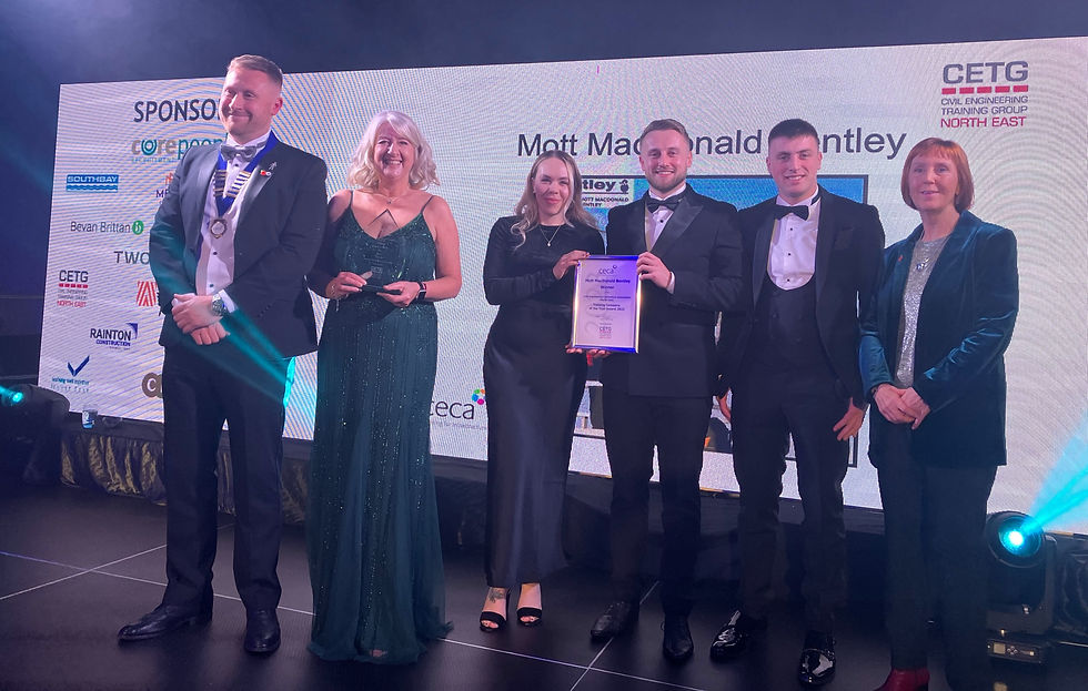 MMB colleagues on stage collecting their CECA North East awards.