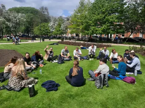 colleagues in Leeds took part in a meditation session in the park during Mental Health Awareness Week.